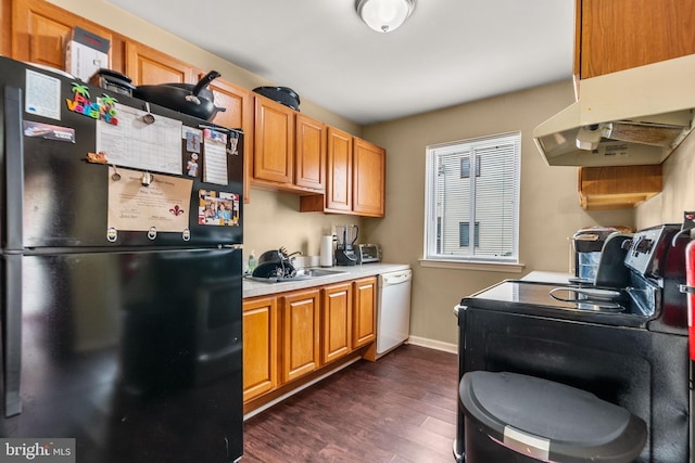 kitchen with black refrigerator, white dishwasher, ventilation hood, range, and dark hardwood / wood-style floors