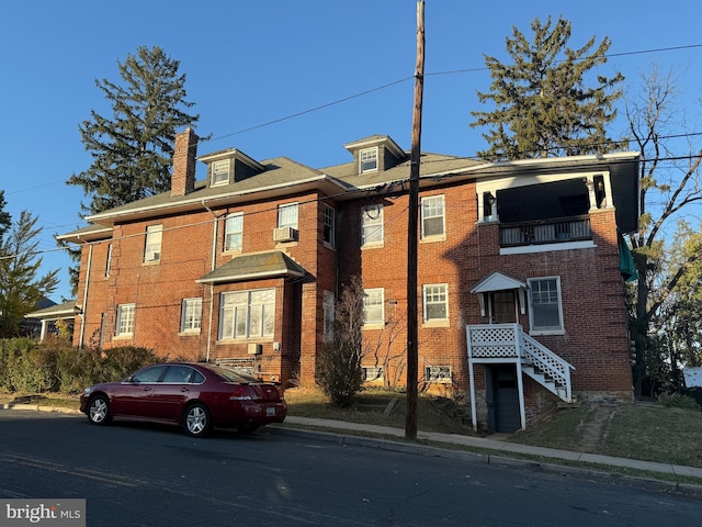 view of front of property with cooling unit