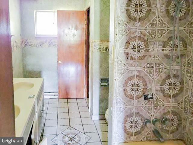 bathroom with vanity and tile patterned floors