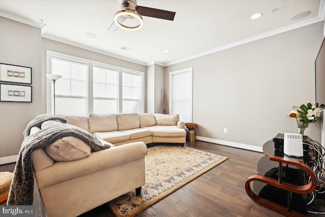 living room featuring hardwood / wood-style flooring, ceiling fan, and ornamental molding