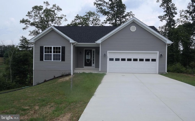 ranch-style home featuring a garage and a front yard