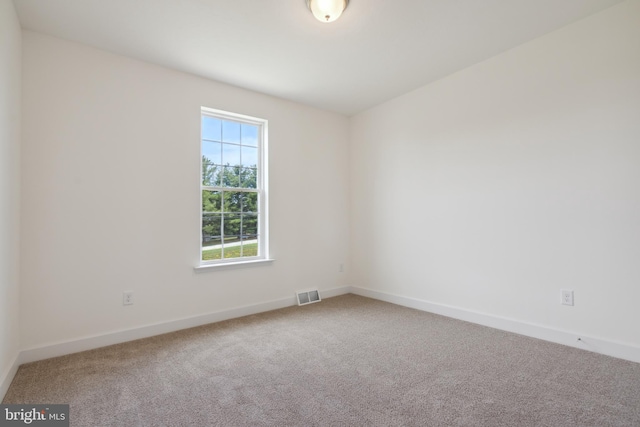 view of carpeted spare room