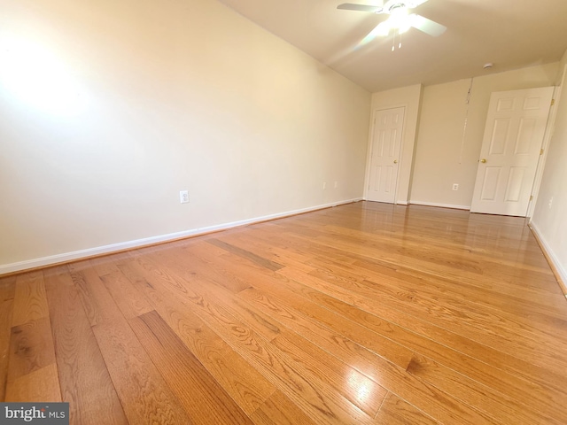 spare room with ceiling fan and light hardwood / wood-style flooring