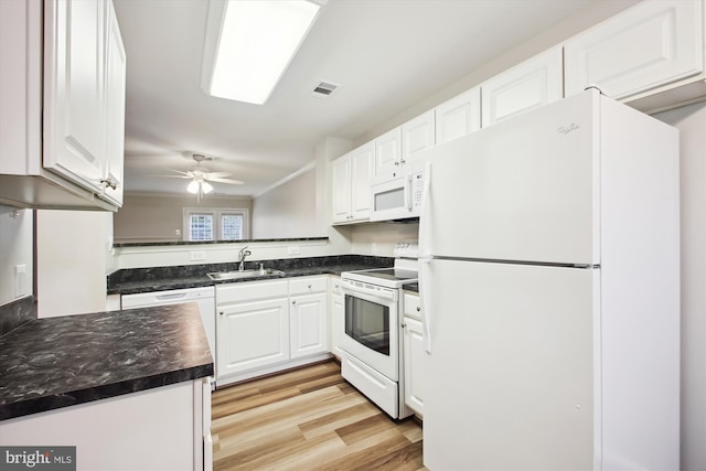 kitchen featuring kitchen peninsula, sink, white cabinetry, light wood-type flooring, and white appliances