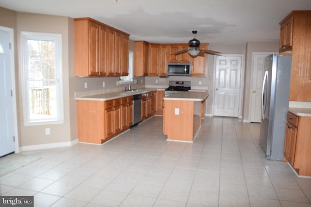 531 Washout Ln, Winchester, VA 22603 - kitchen with a sink, ceiling fan, light countertops, and appliances with stainless steel finishes