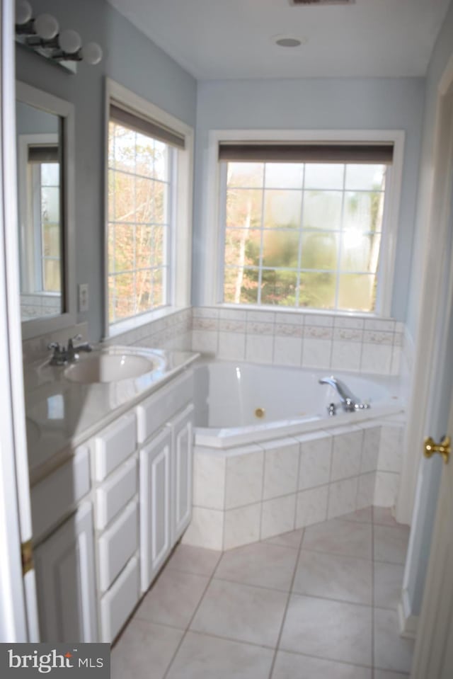 531 Washout Ln, Winchester, VA 22603 - bathroom with vanity, a garden tub, and tile patterned floors