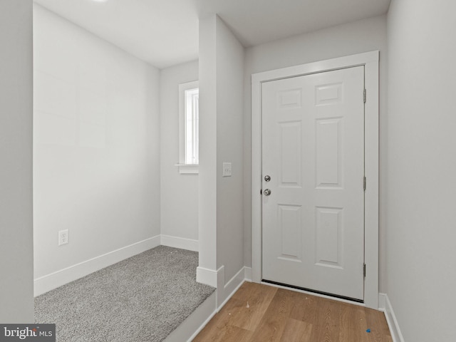 foyer with light wood-type flooring