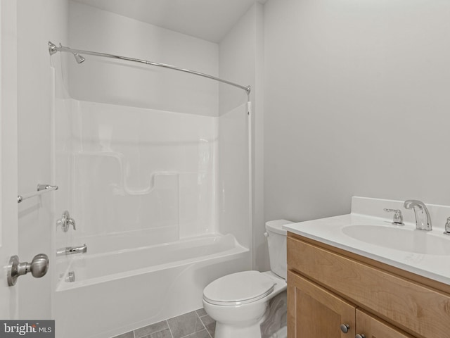 full bathroom featuring tile patterned floors, vanity, toilet, and shower / bathtub combination