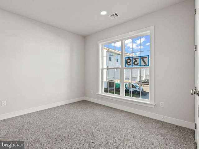 view of carpeted spare room