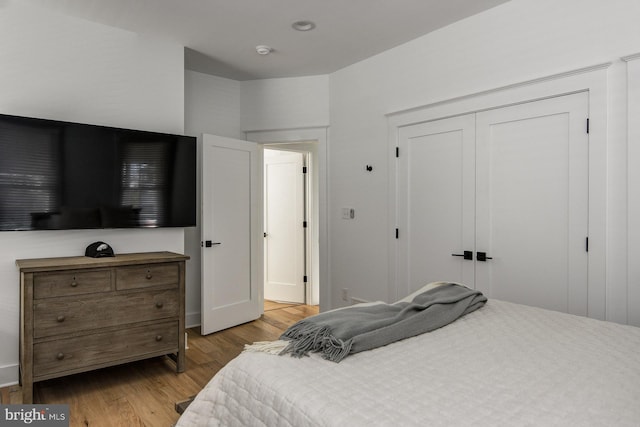 bedroom with light wood-type flooring