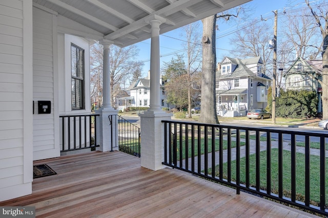 wooden terrace with covered porch