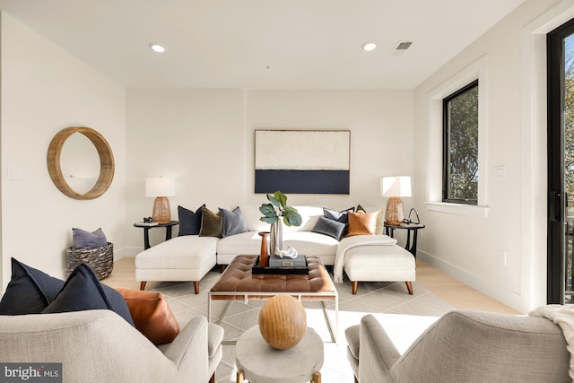 living room with light hardwood / wood-style floors