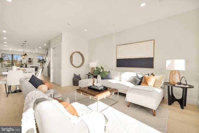 living room with light hardwood / wood-style floors