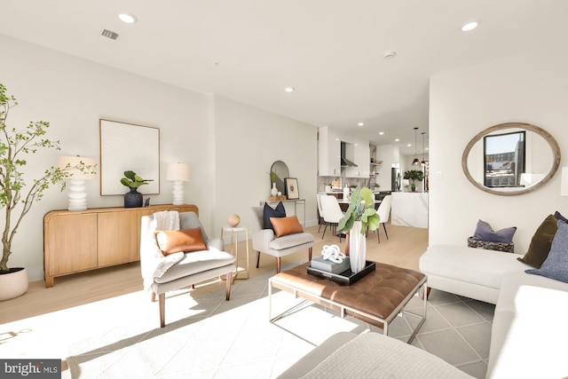 living room with light hardwood / wood-style floors