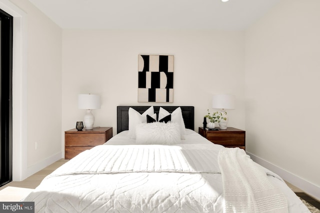 bedroom featuring light wood-type flooring