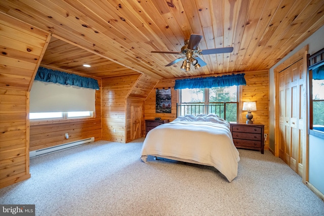 carpeted bedroom with lofted ceiling, ceiling fan, wood ceiling, and a baseboard heating unit