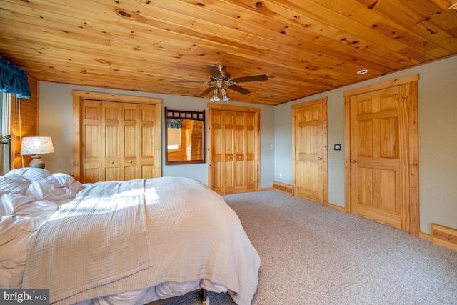 bedroom featuring carpet flooring, ceiling fan, and wood ceiling