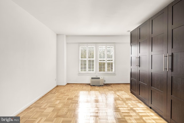 unfurnished bedroom featuring light parquet floors