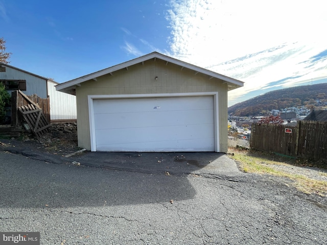 garage featuring a mountain view