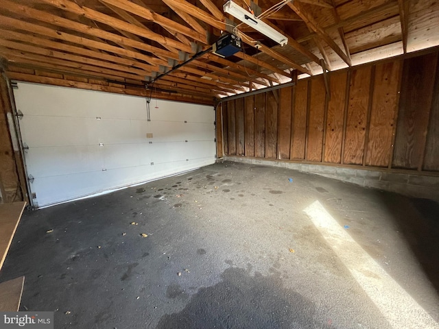 garage featuring a garage door opener