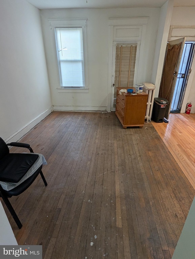 interior space with dark hardwood / wood-style floors