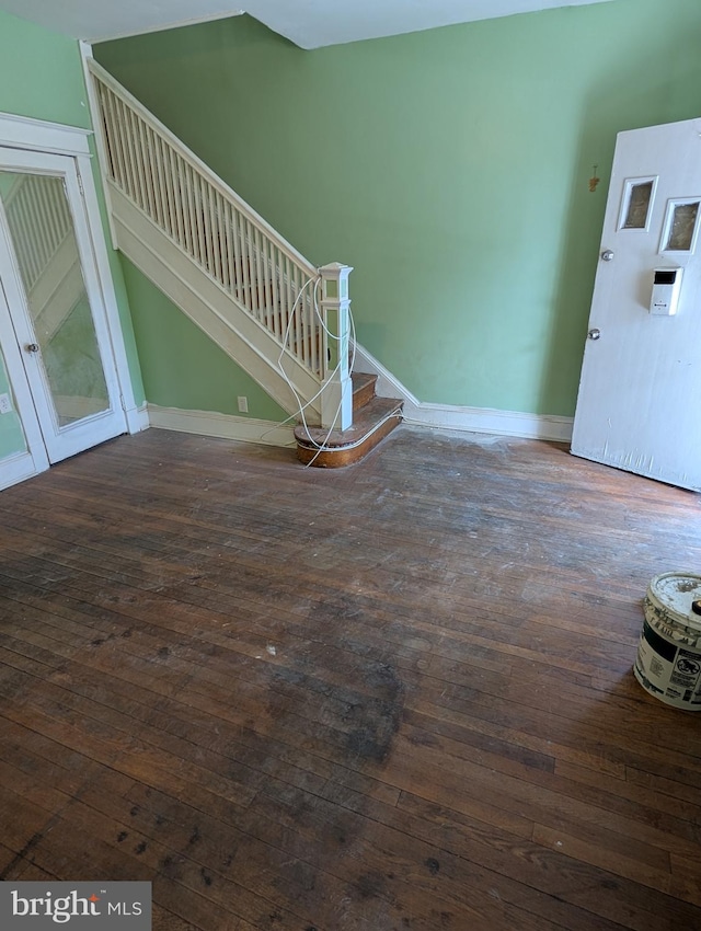 interior space with dark wood-type flooring