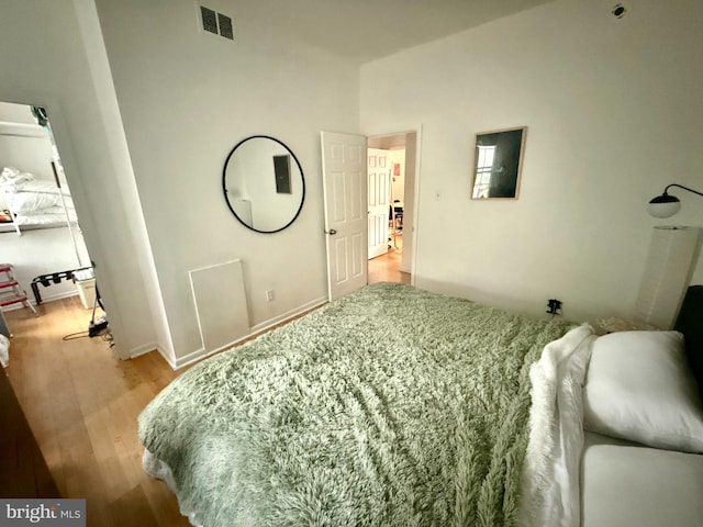 bedroom with light wood-type flooring