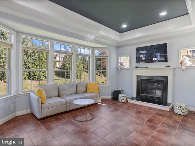 sunroom with a raised ceiling