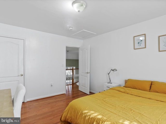 bedroom featuring hardwood / wood-style flooring