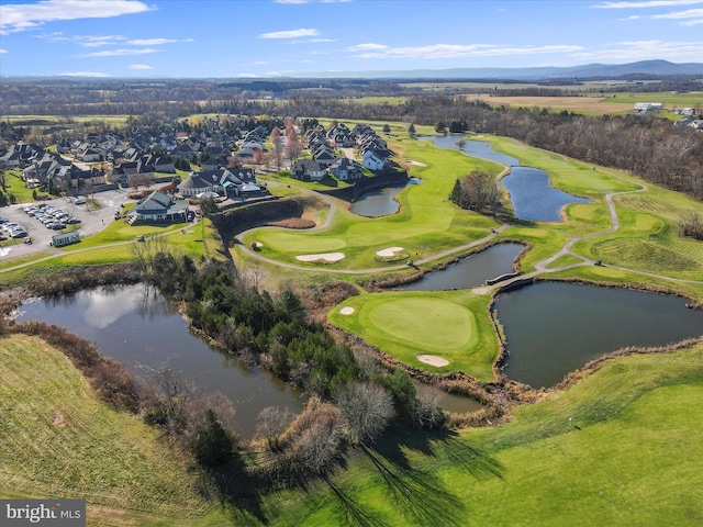 bird's eye view featuring a water and mountain view