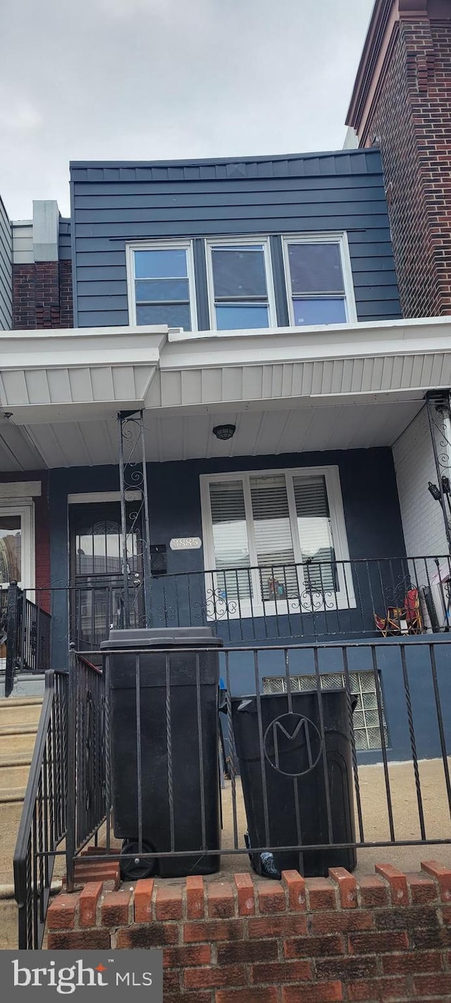 entrance to property with a porch