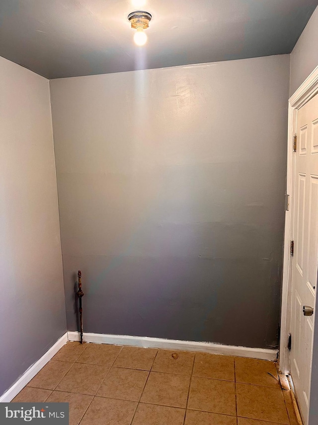 laundry room with tile patterned flooring