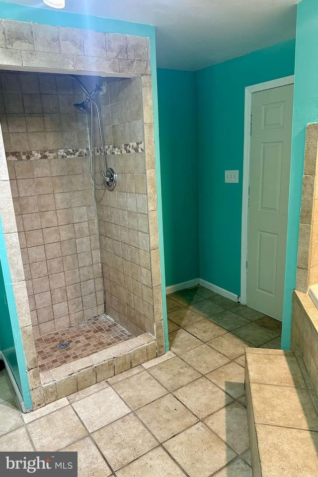 bathroom featuring tiled shower