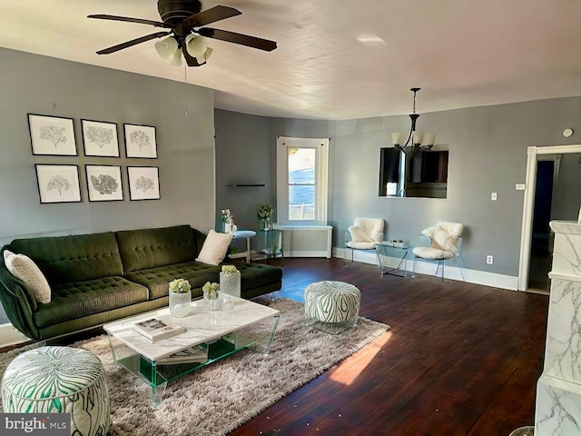 living room with hardwood / wood-style flooring and ceiling fan