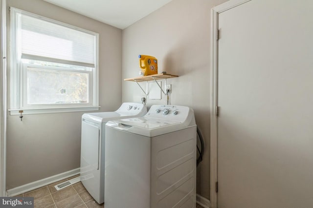 laundry room featuring washer and dryer