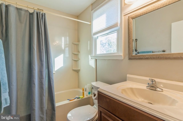 full bathroom featuring vanity, toilet, and shower / bathtub combination with curtain