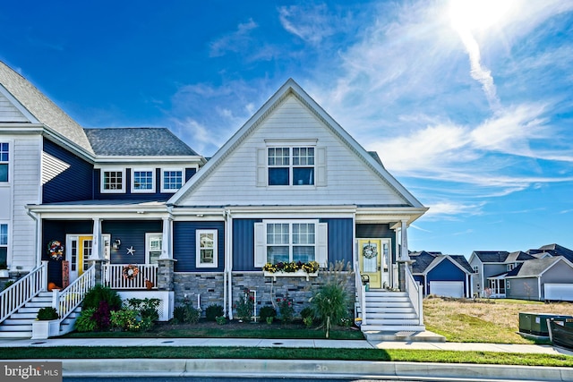 view of front of property with a front lawn and a porch