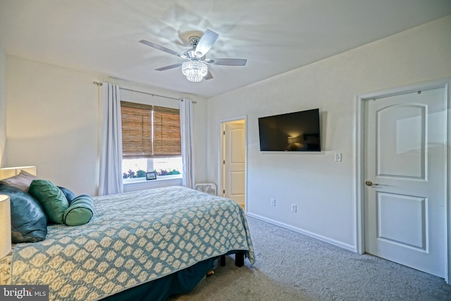 bedroom with ceiling fan and carpet floors