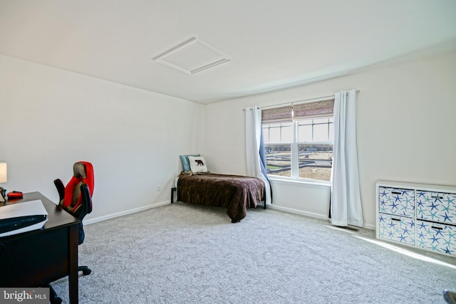 bedroom featuring light carpet