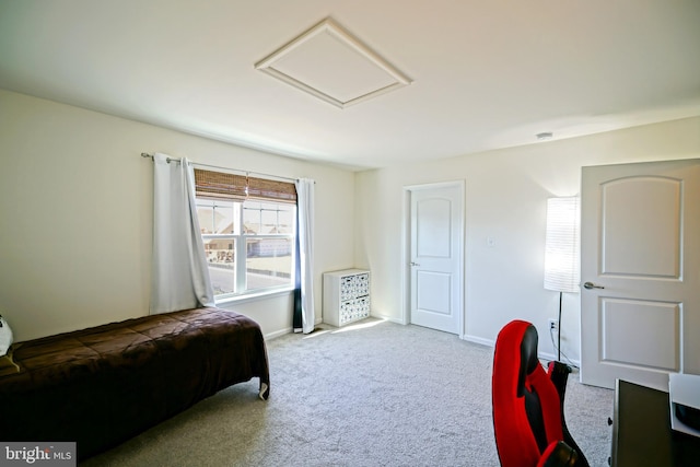 bedroom featuring light colored carpet