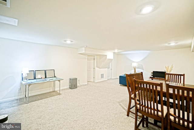 view of carpeted dining space