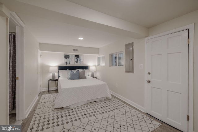 bedroom with light hardwood / wood-style floors