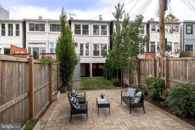 rear view of house with a patio area