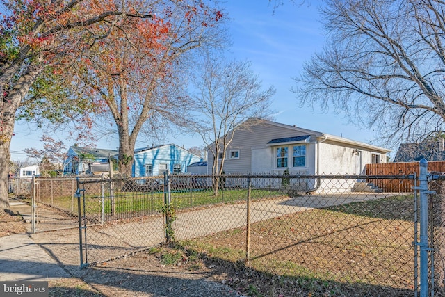 view of property exterior featuring a lawn