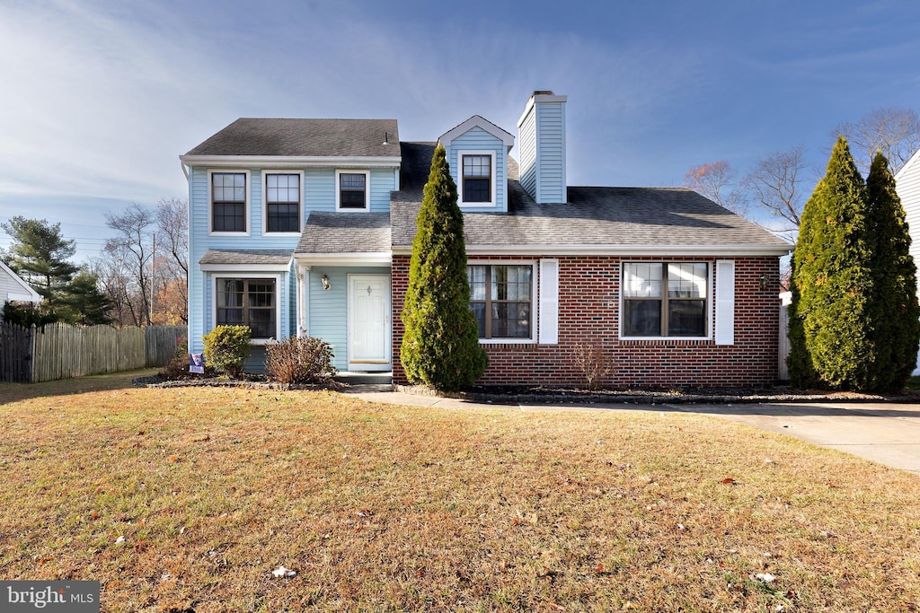 view of property featuring a front yard