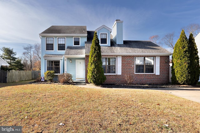 view of property featuring a front yard