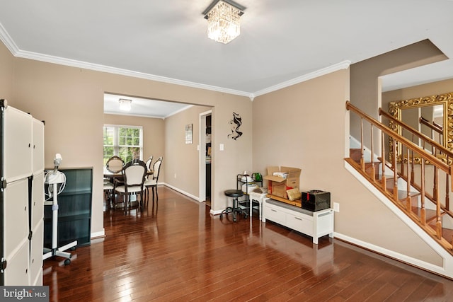 interior space with dark wood-type flooring and crown molding