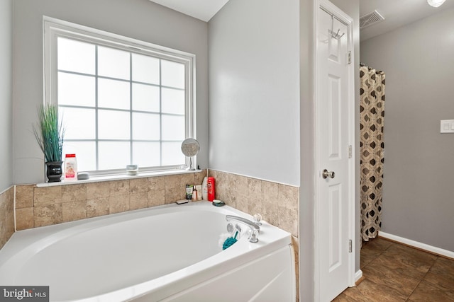 bathroom featuring a bathtub