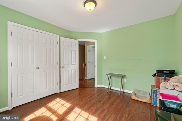 miscellaneous room with wood-type flooring