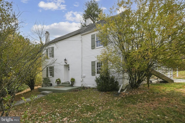 exterior space featuring a yard